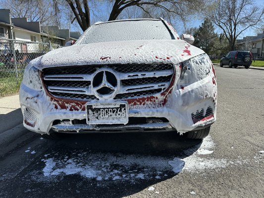 White SUV exterior after mobile detailing service by Next Mile Enterprises in Houston