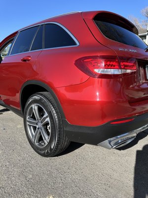 Red car exterior detailed clean by Next Mile Enterprises mobile detailing in Houston